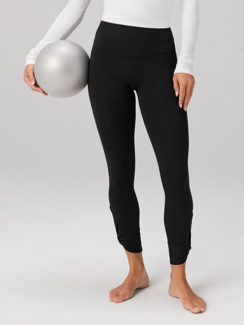 Fabletics Black High-Rise Leggings with Twisted Knot Tulip Hem & Pockets